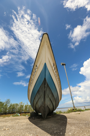 Blue and White Skiff